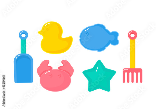 a set of children's toys and sand molds with a children's shovel and rake. concept of childrens rest in the sandbox or on the beach