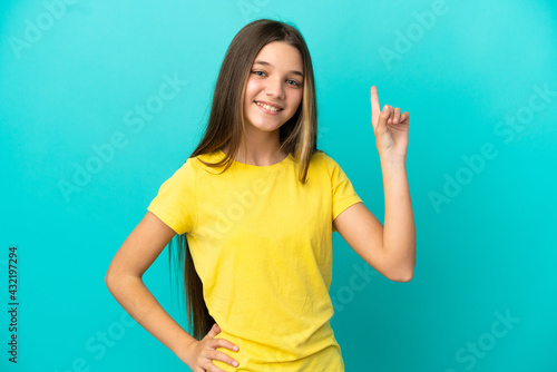 Little girl over isolated blue background showing and lifting a finger in sign of the best