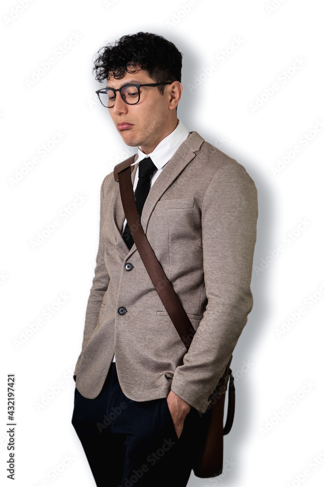 Young business man, stressed, worried and upset. Dressed in a suit, a classic hat and glasses. White studio background Young business man, stressed, worried and upset. Dressed in a suit, a classic hat and glasses. White studio background