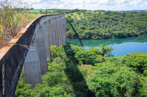 Partial landscape with reflections in the water, seen over the Pontilhao de Uberlândia, over the waters of the Araguari River, Municipality of Uberlândia State of Minas Gerai, Brazil