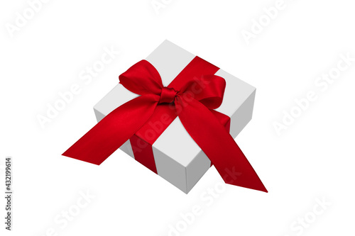 White gift box with red bow ribbon isolated on white background. 