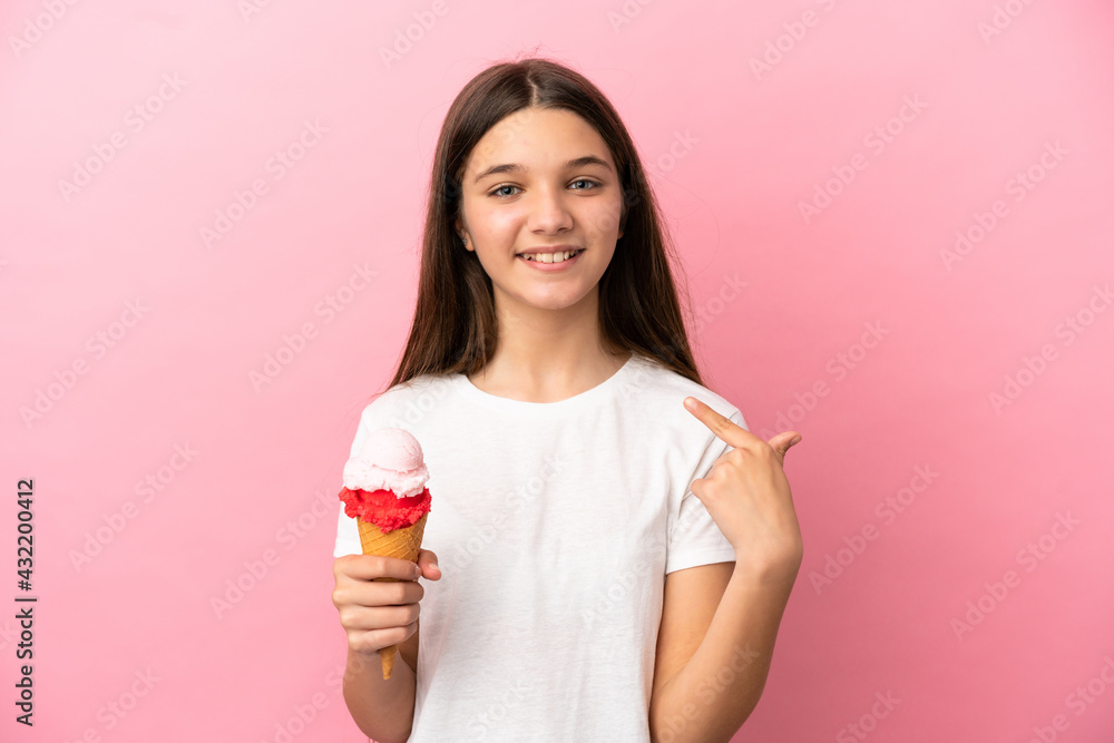 Little girl with a cornet ice cream over isolated pink background giving a thumbs up gesture Little girl with a cornet ice cream over isolated pink background giving a thumbs up gesture