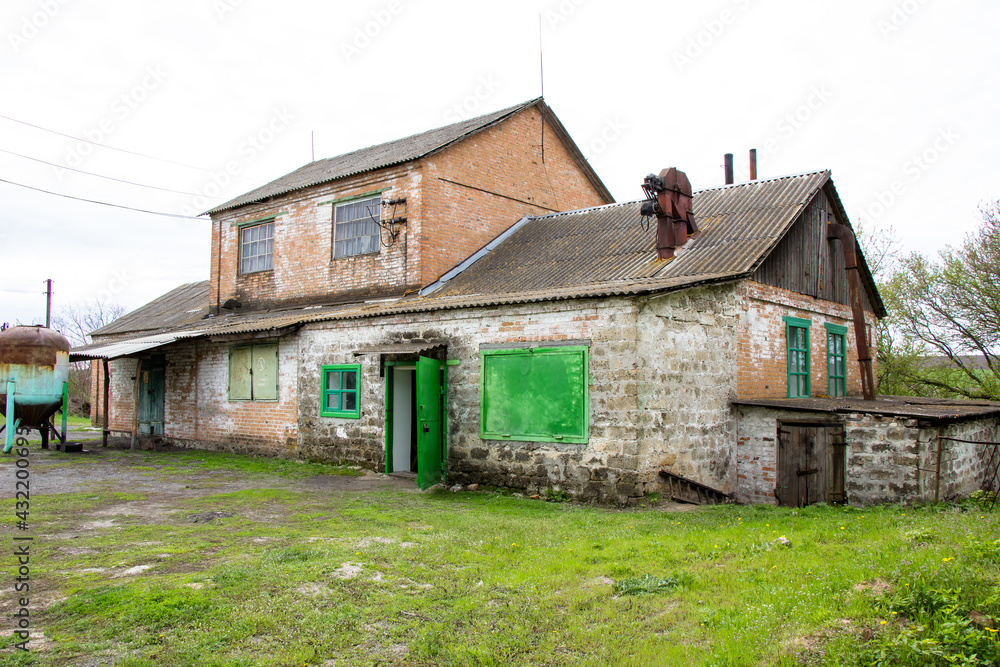 In rural areas, a universal building made of bricks oil mill grain slaughterhouse slaughterhouse Ukraine In rural areas, a universal building made of bricks oil mill grain slaughterhouse slaughterhouse Ukraine