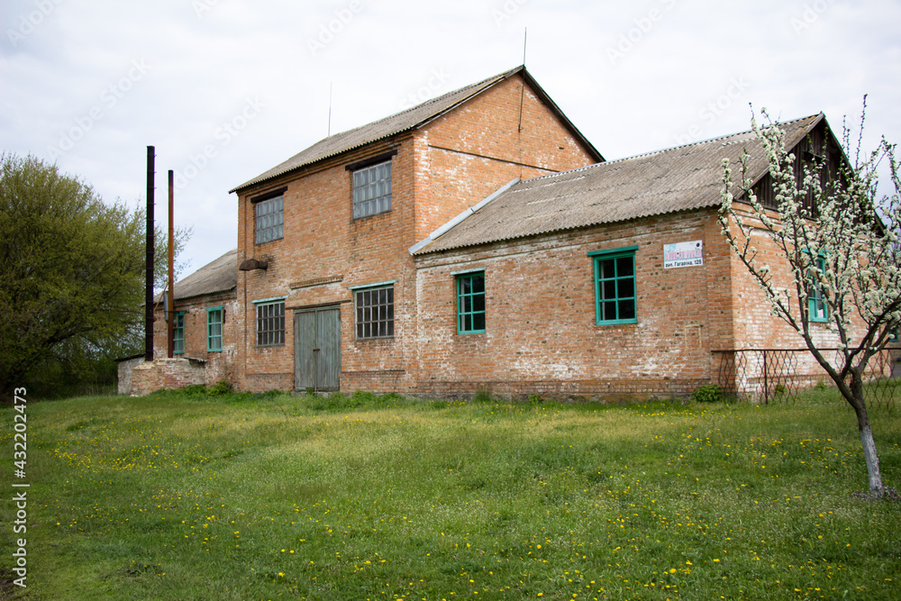 In rural areas, a universal building made of bricks oil mill grain slaughterhouse slaughterhouse Ukraine