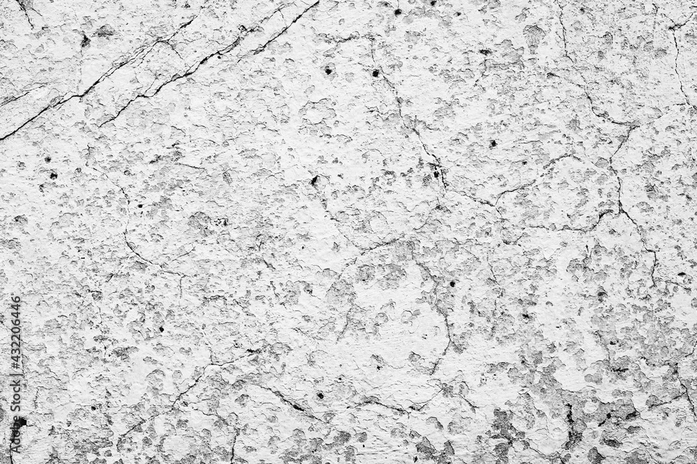 Texture of a concrete wall with cracks and scratches which can be used as a background Texture of a concrete wall with cracks and scratches which can be used as a background