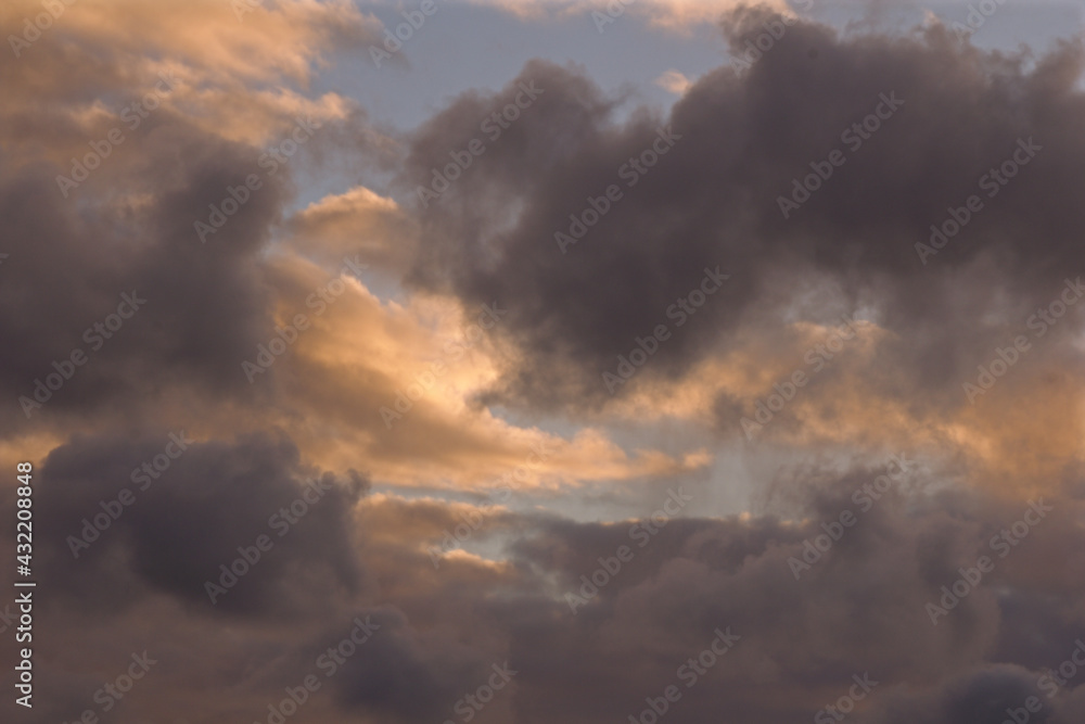 Pink  cumulus clouds at sunset background