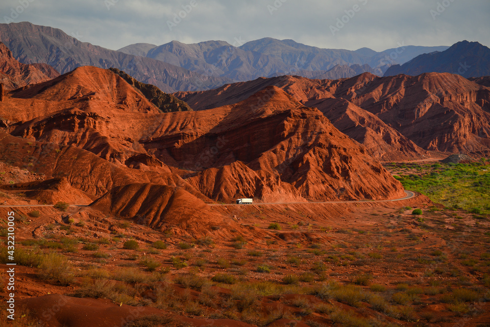 A truck on the road through the amazing Quebrada de Cafayate, or Quebrada de las Conchas, Salta Province, northwest Argentina