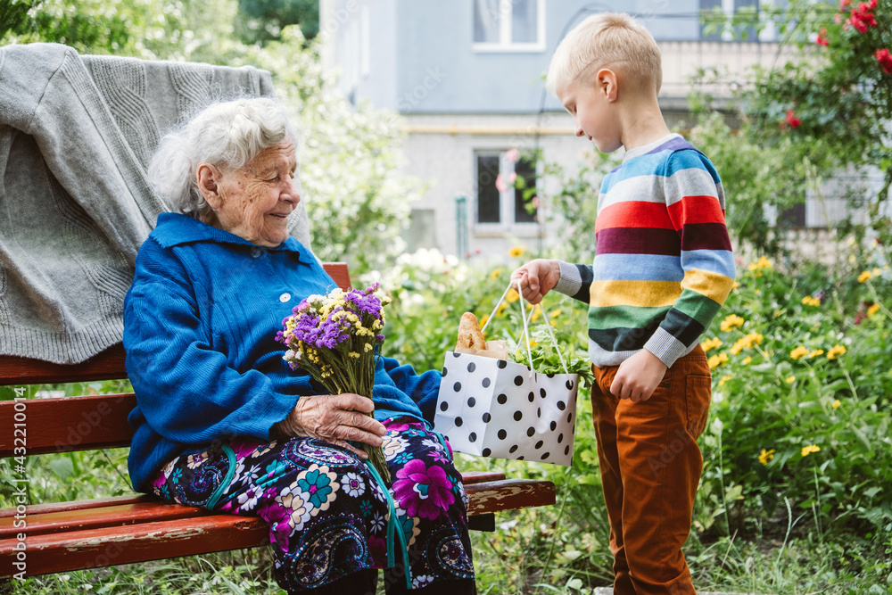 90 year old great-grandmother, grandmother with grandson together ...