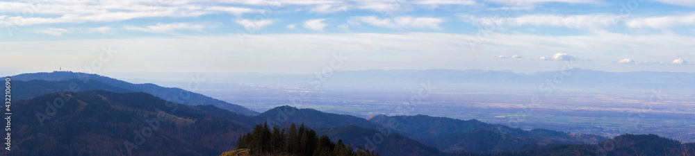 Panorama from the Belchen Mountain in the Black Forest, Germany, to the Rhine Valley and the Vosges Mountains behind it and the Peak Blauen on the left