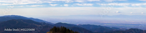 Panorama from the Belchen Mountain in the Black Forest  Germany  to the Rhine Valley and the Vosges Mountains behind it and the Peak Blauen on the left