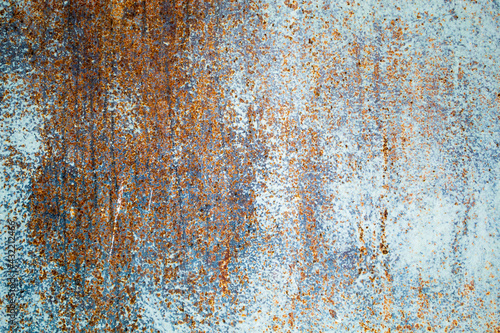 Green metal and Rusty. Old metal iron rust texture. Grunge textured metal surface. Rusted metal background. The external surface rust. Ugly spaces of deep rust.