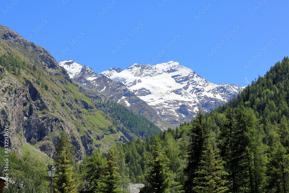 Landscape on Alps mountains in a sunny summer day near Cogne