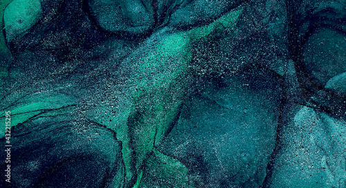 Abstract fluid ink painting background tidewater green colors