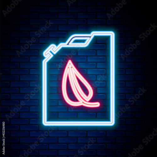 Glowing neon line Bio fuel canister icon isolated on brick wall background. Eco bio and barrel. Green environment and recycle. Colorful outline concept. Vector
