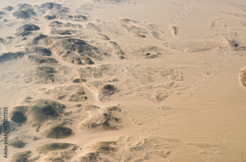 view from the plane window of the desert in Egypt