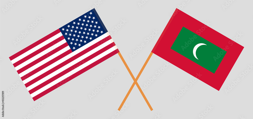 Crossed flags of the USA and Maldives. Official colors. Correct proportion Crossed flags of the USA and Maldives. Official colors. Correct proportion