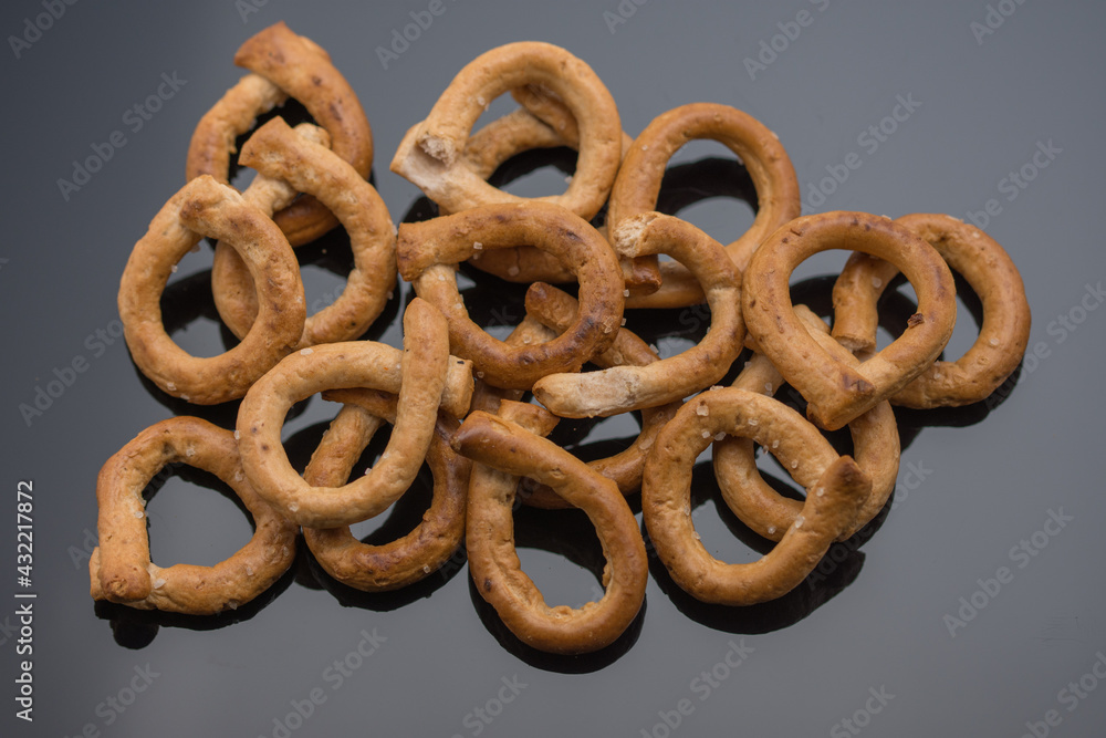 Pretzels crackers bagels with wine,crispy goodies with lemon and pepper Pretzels crackers bagels with wine,crispy goodies with lemon and pepper