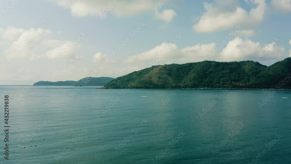 ubatuba Brazil coastline with dolphins yacht boat ocean travel tourism aerial 4k