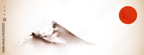 Rocky mountain and big red sun in vintage style. Traditional oriental ink painting sumi-e, u-sin, go-hua. Hieroglyphs - eternity, freedom, happiness, well-being.