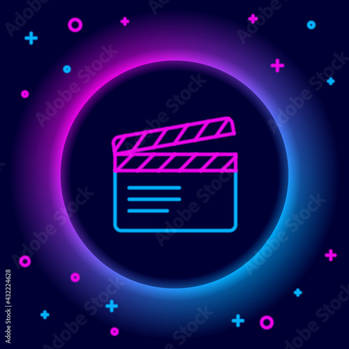 Glowing neon line Movie clapper icon isolated on black background. Film clapper board. Clapperboard sign. Cinema production or media industry. Colorful outline concept. Vector