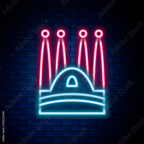Glowing neon line Sagrada Familia Cathedral at Barcelona, Spain icon isolated on brick wall background. Colorful outline concept. Vector
