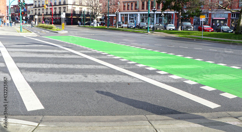 Victoria Downtown, Canada.  Bike and Pedestrian Friendly City  with Historical buildings.  Cross walk and Green Bicycle Lane. Vancouver Island