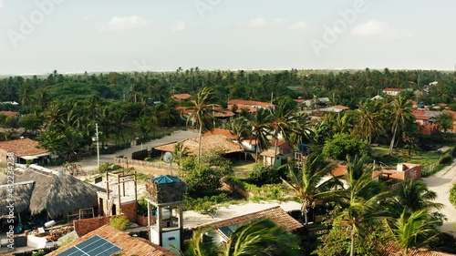 brazil atins summer vaction holiday huts camp aerial view overview palms 4k photo