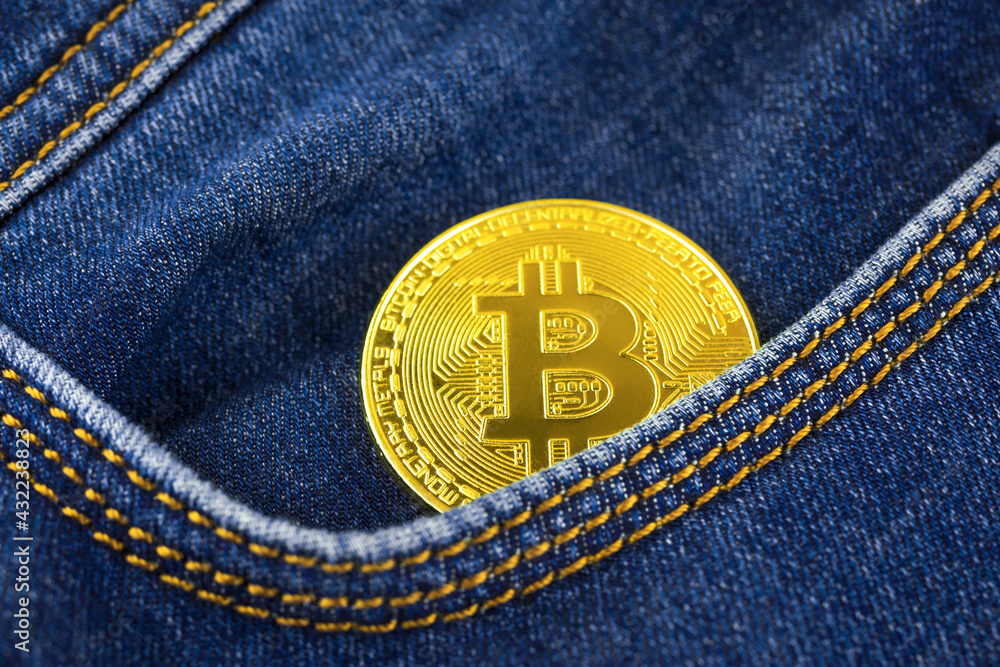 Golden bitcoin in pocket, crypto currency business and financial background, investment and savings concept photo Golden bitcoin in pocket, crypto currency business and financial background, investment and savings concept photo
