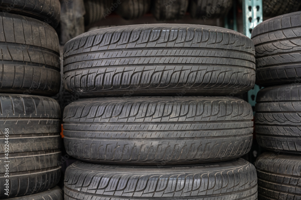 stack of old car or truck tires stack of old car or truck tires