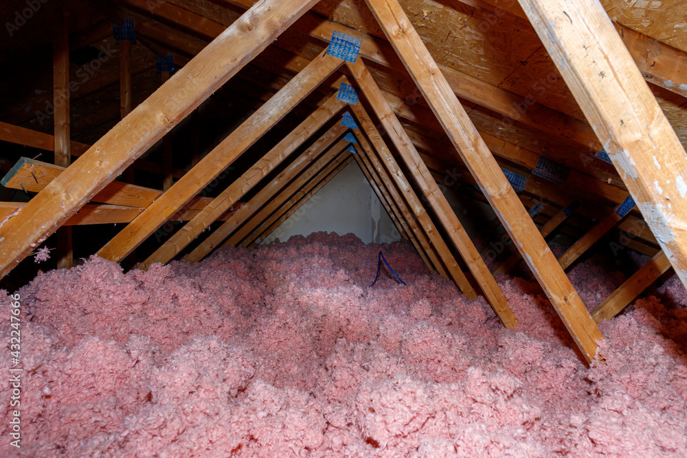 Attic with loosefill fiberglass insulation Stock Photo Adobe Stock