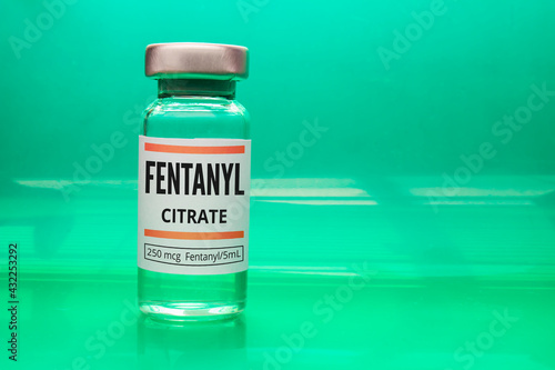 A Fentanyl Citrate vial on a green background