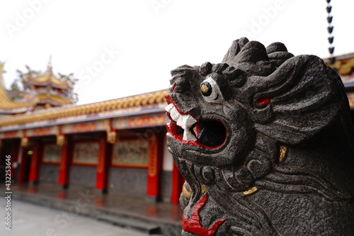 Text is Seitengu. Seitengu, a Taiwan temple or a palace in Sakado City, Saitama Prefecture in Japan. There are 5,000 dragon sculptures.  photo