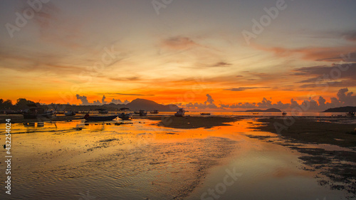 red sunrise over sea footage. Nature image High quality footage. Scene of Colorful romantic sky sunrise the sky background. beautiful sky at sunrise in nature and travel concept.