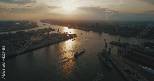 hamburg harbour sunset boat aerial panorama overview drone industrial container boat 4k