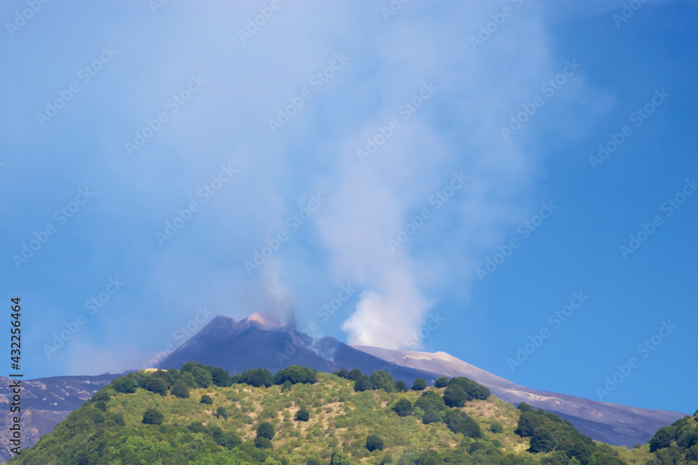 Eruption of Volcano Mt Etna and rising of a tall column of smoke on August 11, 2011 - Catania, Sicily Eruption of Volcano Mt Etna and rising of a tall column of smoke on August 11, 2011 - Catania, Sicily