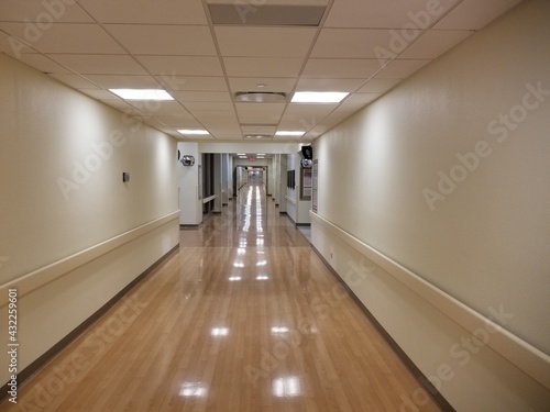 Empty Hospital Corridor with Handrails, Bright Lights