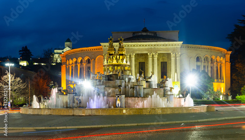 Night view of grandiose composition of Colchis Fountain on main square of Kutaisi on background of Lado Meskhishvili State Academic Theatre in spring  Georgia