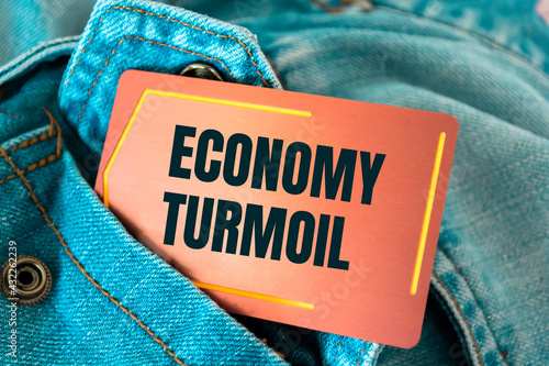 Text sign showing economy turmoil