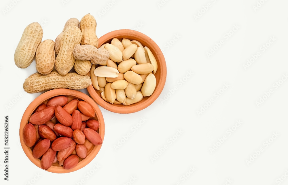variety of peeled and roasted peanuts in shell. top view with copy space variety of peeled and roasted peanuts in shell. top view with copy space