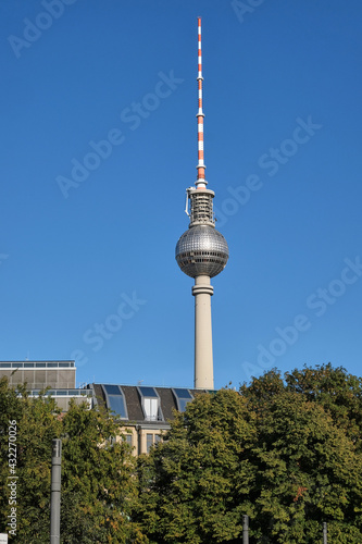 The Fernsehturm, Berlins highest building, with a clear blue sky photo