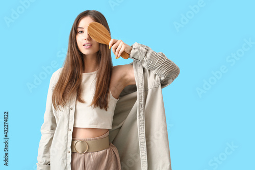 Beautiful young woman with ...