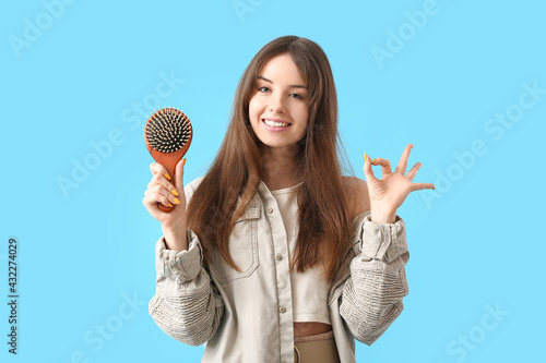 Beautiful young woman with ...