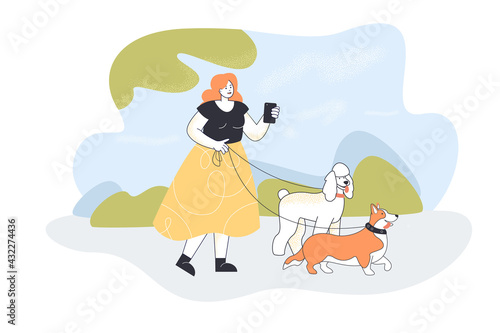 Woman with phone walking dogs. Cartoon human on walk with corgi and poodle in park flat vector illustration. Pets, outdoor activity, lifestyle concept for banner, website design or landing web page