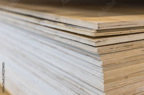 Plywood sheets in the store. Lumber is sold at the supermarket in the warehouse. Multi-layer plywood.