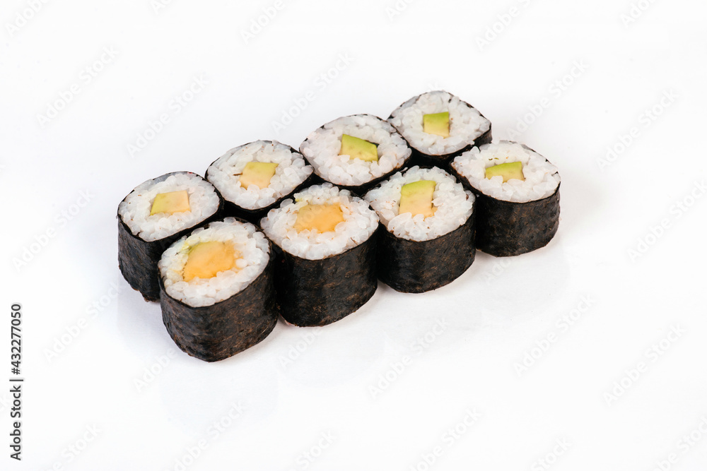 Sushi rolls with avocado. Isolated on white background. Sushi rolls with avocado. Isolated on white background.