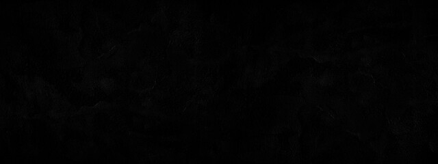 Black background. Dark abstract background with copy space for design. Wide banner.