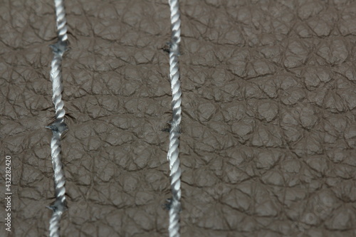 high-quality genuine leather texture with decorative seam