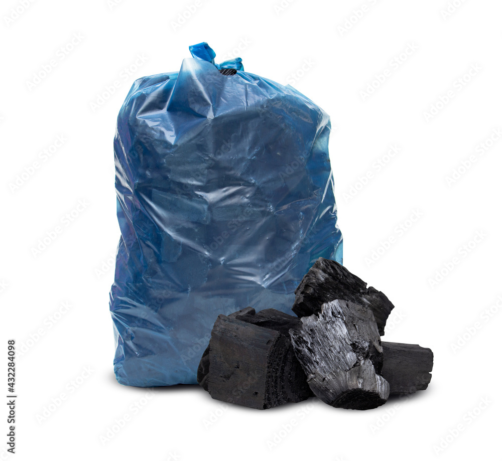 Heap of natural black activated charcoal granules In plastic bag blue or hardwood charcoal isolated on white background