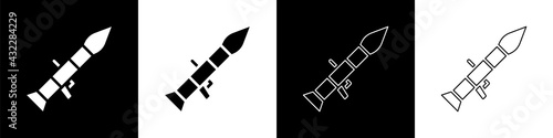 Set Rocket launcher with missile icon isolated on black and white background. Vector