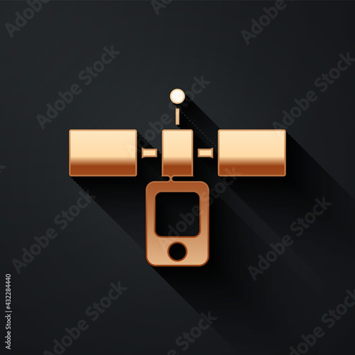 Gold Satellite icon isolated on black background. Long shadow style. Vector